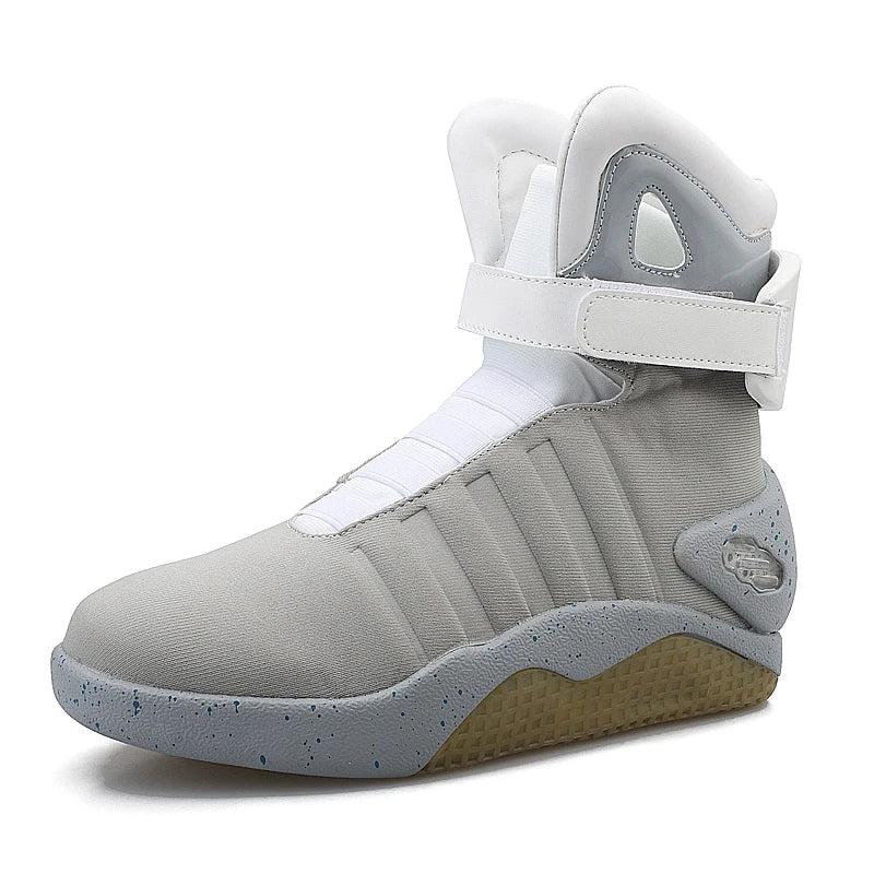 Gray high-top sneaker with white accents on a white background. Infographic comparing the insulation ratings and battery life of the Voidwear GHOSTCORE_8X boots versus competitor tactical footwear