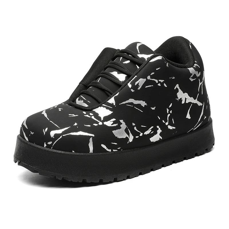 Men’s VOIDWEAR VDR_VANISH_02 shadow winter boots with platform sole, microfiber leather, and ritual-inspired design, styled for urban streetwear. Black sneaker with white abstract pattern on a white background