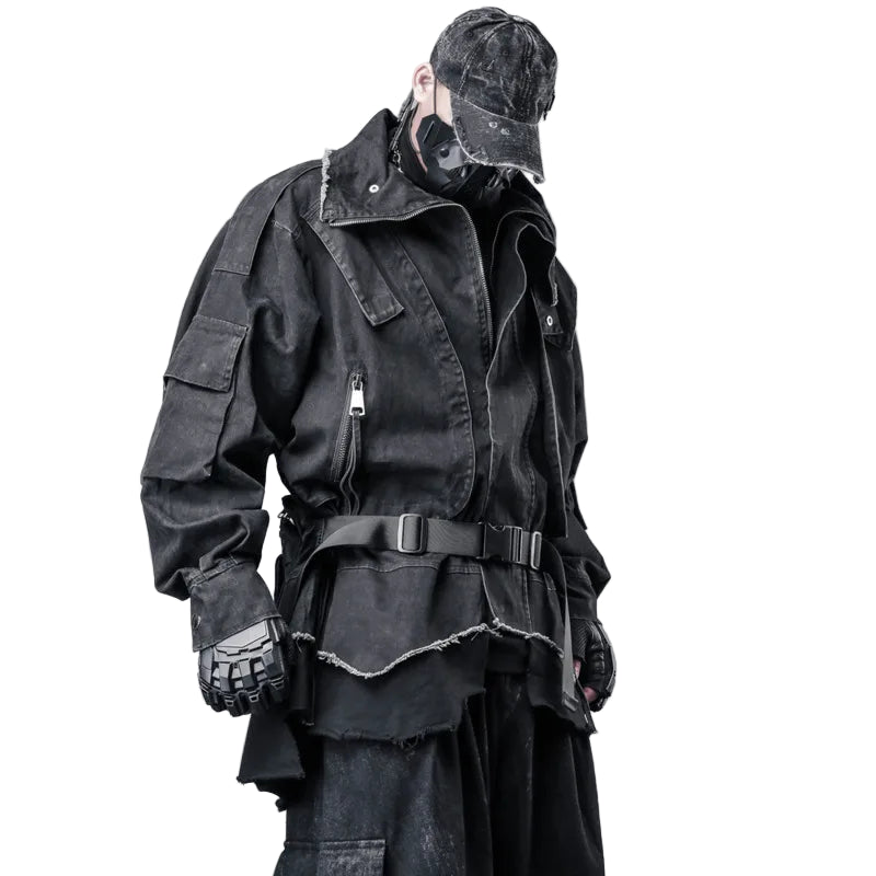VOIDWEAR VDR_SYSTEM_09 Shadow Jacket — oversized safari-style techwear coat with layered two-piece illusion and ritual-inspired detailing. Person wearing a dark, layered outfit with a cap and gloves, standing against a gray background with 'HKSH' branding.