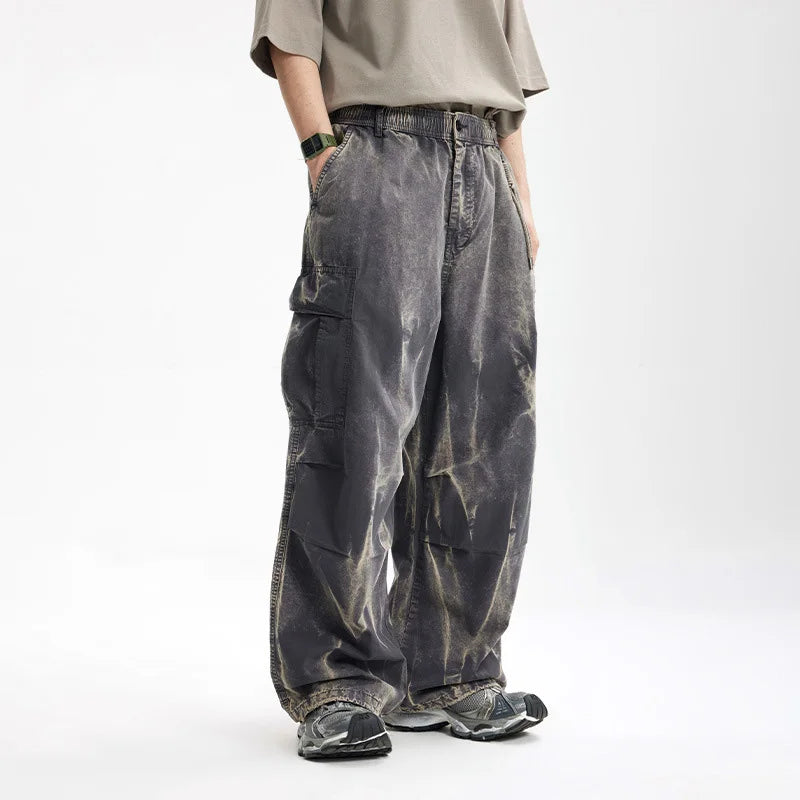 VOIDWEAR SIGNAL_SHIFT_09 ☰ loose cargo pants styled in Tokyo side street, pleated cotton texture and dirty-fit detailing visible