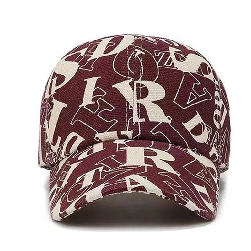 VOIDWEAR Ritual-Inspired Streetwear. Maroon and beige cap with letter pattern on a white background