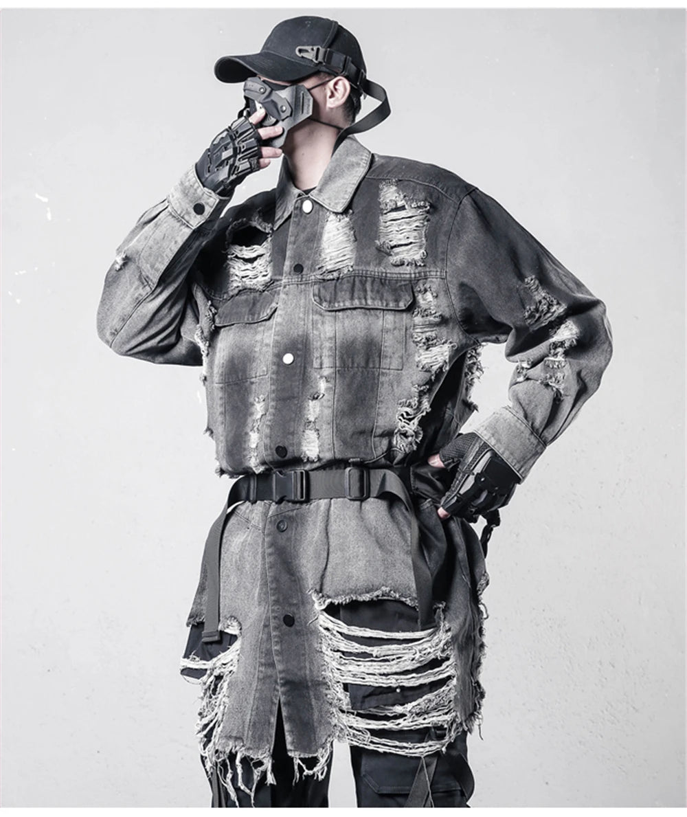 VOIDWEAR VDR_SIGNAL_07 Ritual Jacket — distressed long denim coat with ripped holes, glyph detailing, and loose high-street fit.
