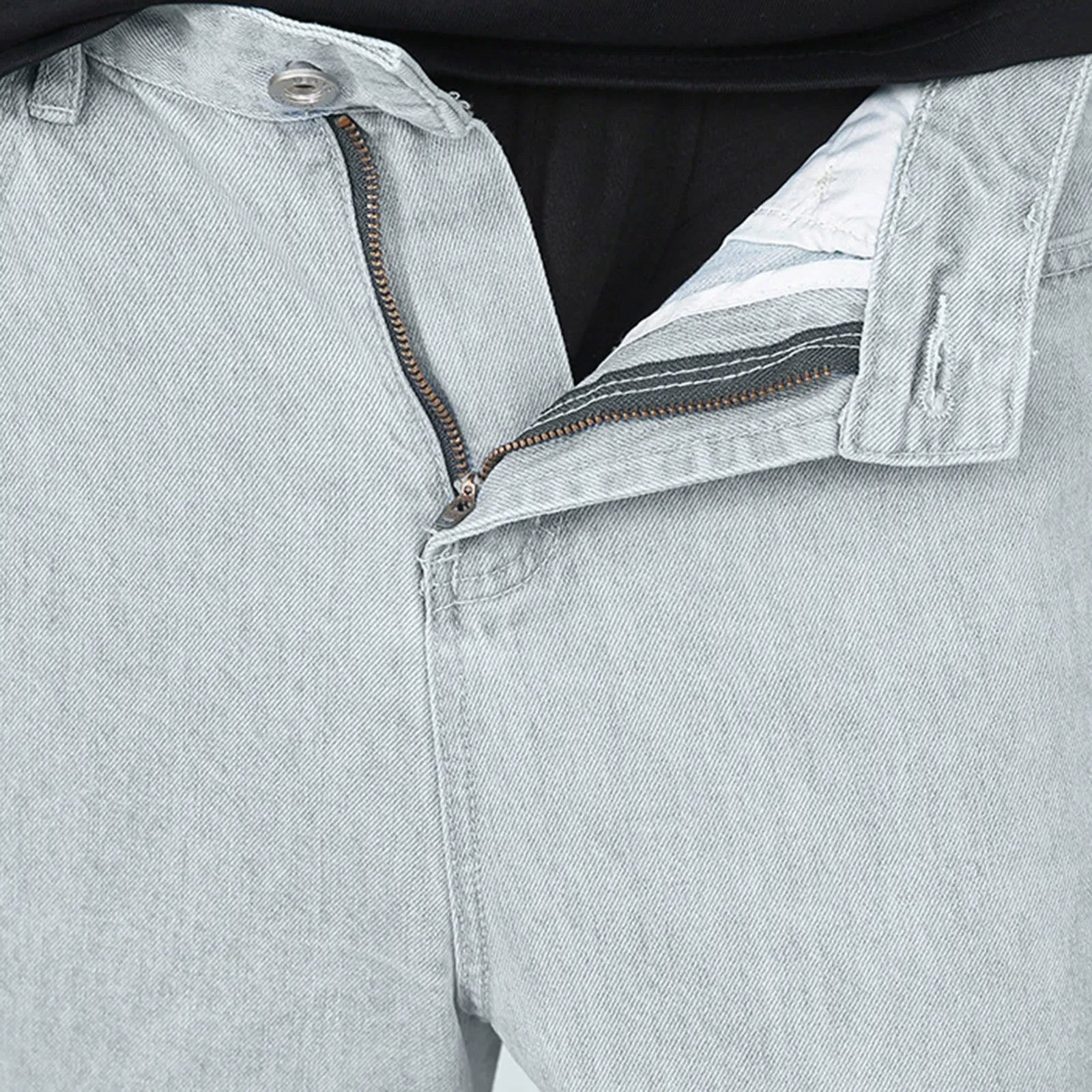 VOIDWEAR VDR_VANISH_01 ☰ hybrid overalls-style baggy jeans, distressed light denim, glyph tab signal detailing, streetwear silhouette