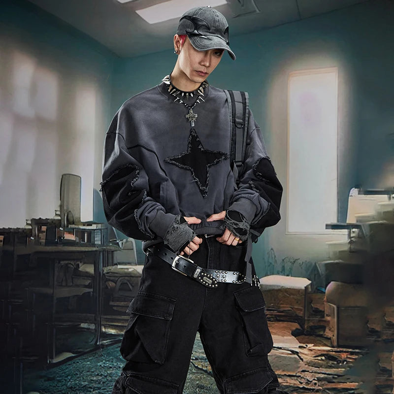 VOIDWEAR SIGNAL_BURR_07 ☰ long sleeve worn in Berlin underpass; star patchwork visible across chest, matte lighting accentuating texture