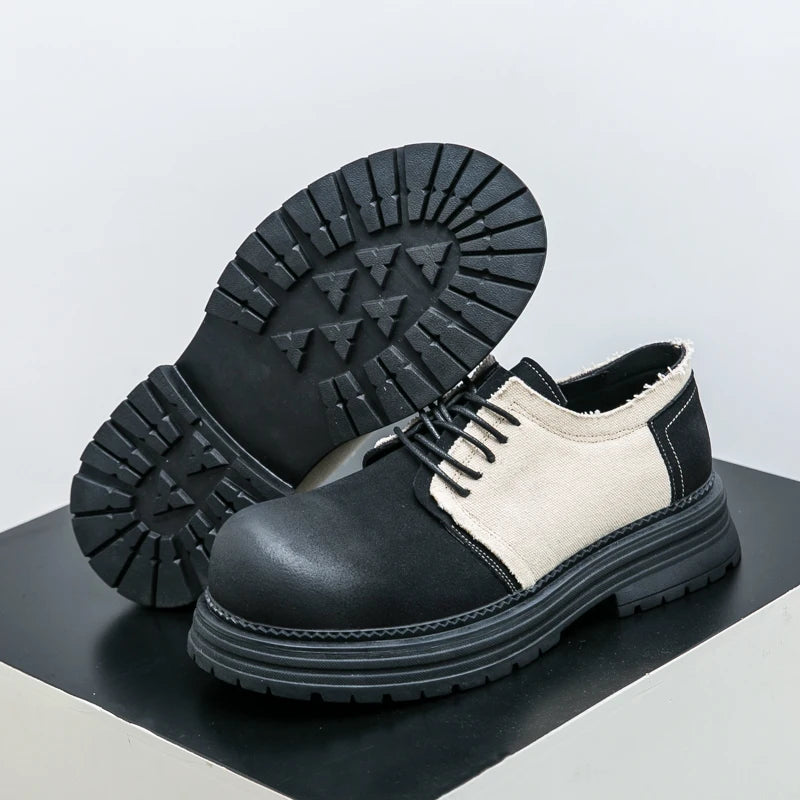 Black and white shoes with thick soles on a reflective surface. VOIDWEAR SIGNAL_VANISH_06 ☰ Derby System Shoes in Oxford fabric with PU lining and rubber outsole, ritual-inspired hybrid streetwear footwear