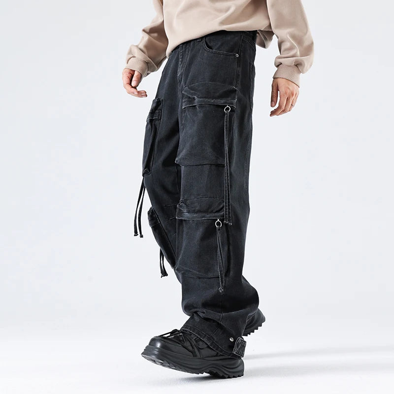 VOIDWEAR SIGNAL_CITY_09 ☰ cargo denim worn in Tokyo side street, multi-pocket structure visible under urban light.