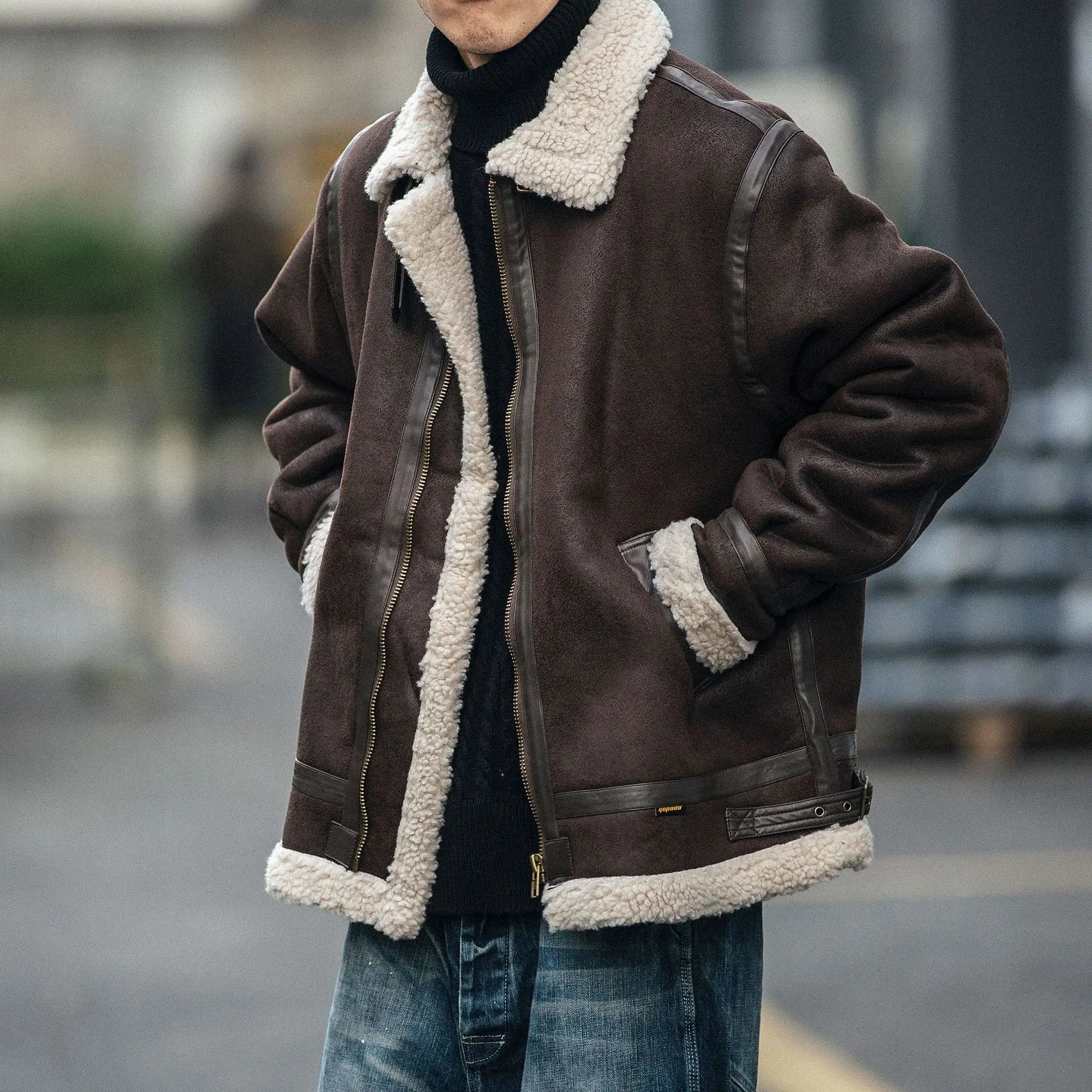 VOIDWEAR SIGNAL_VANISH_09 ☰ jacket worn in Berlin winter street alley, patchwork cotton-padded structure visible under cold light.