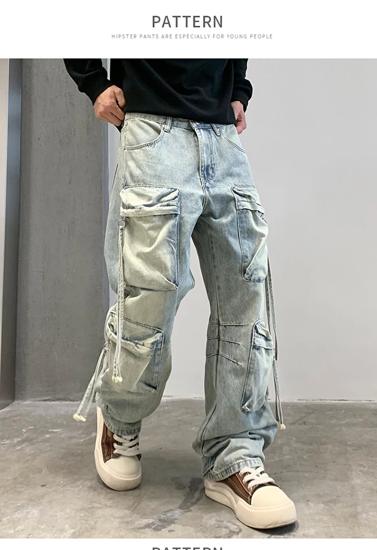 VOIDWEAR SIGNAL_CITY_09 ☰ cargo denim worn in Tokyo side street, multi-pocket structure visible under urban light.