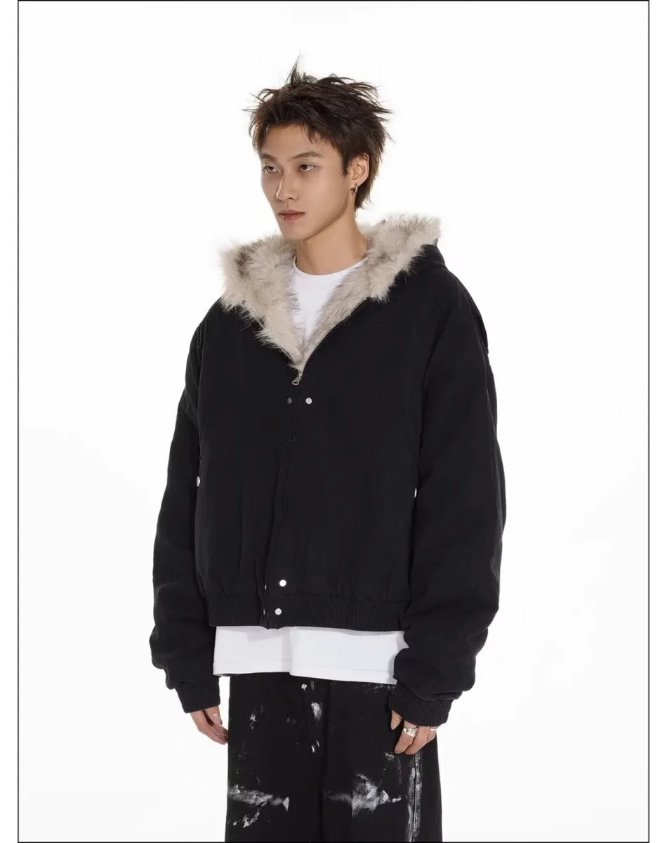 VOIDWEAR™ VDR_25 — a unisex oversized plush hooded jacketPerson wearing a black jacket with fur-lined hood on a white background
