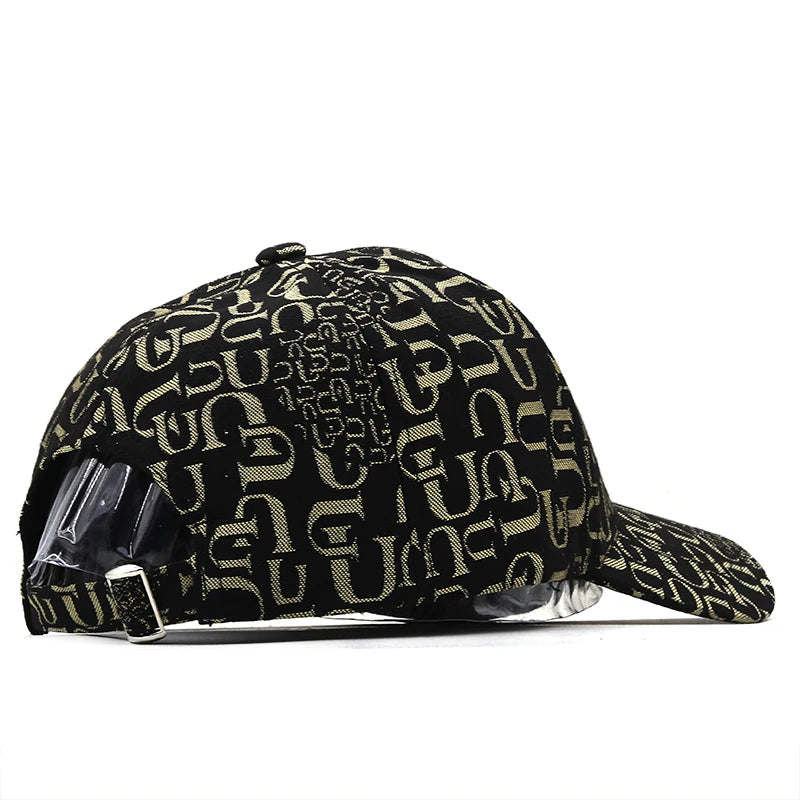 VOIDWEAR SIGNAL_VANISH_05 graffiti washed cotton snapback cap with embroidered insignia, photographed in U.S. urban summer streetwear settingBlack cap with beige pattern on a white background