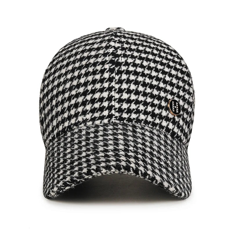 VOIDWEAR SIGNAL_SHADOW_07//◐ houndstooth plaid baseball cap with diamond label insignia and adjustable strap, styled in urban U.S. winter setting.
