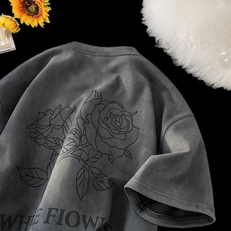 VOIDWEAR VDR_FLO_09 oversized goth floral graphic t-shirt in apricot, styled for streetwear layering. Gray sweatshirt with black rose design and text on a dark background