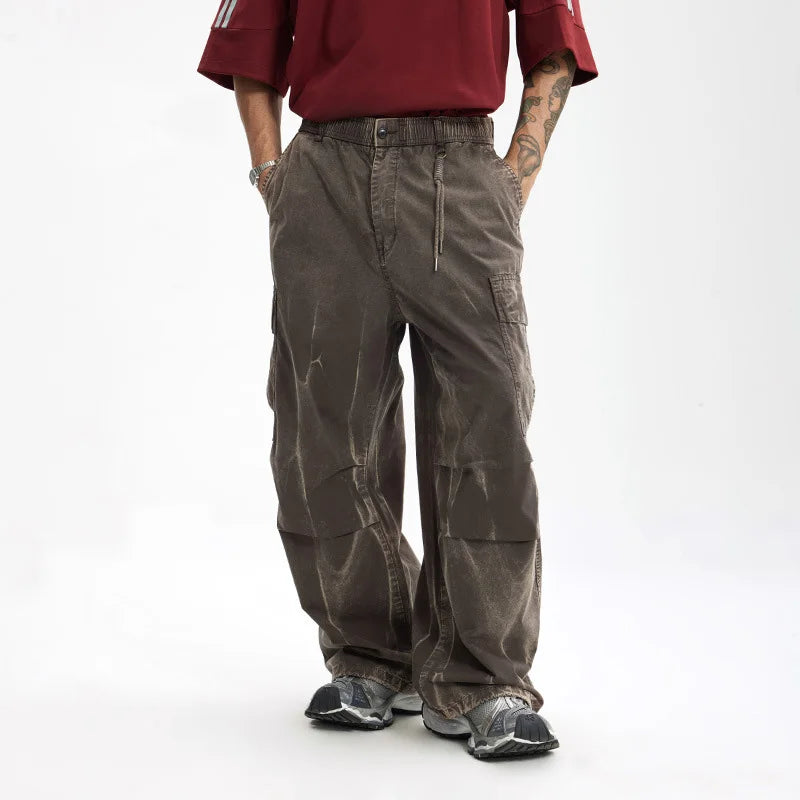 VOIDWEAR SIGNAL_SHIFT_09 ☰ loose cargo pants styled in Tokyo side street, pleated cotton texture and dirty-fit detailing visible