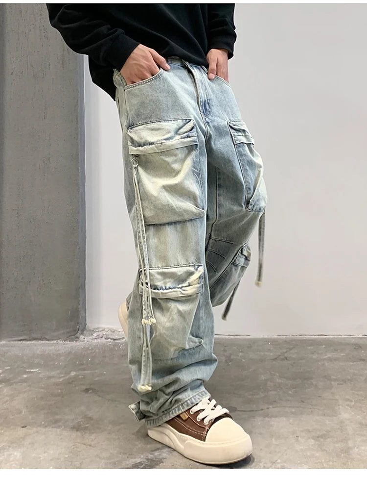 VOIDWEAR SIGNAL_CITY_09 ☰ cargo denim worn in Tokyo side street, multi-pocket structure visible under urban light.