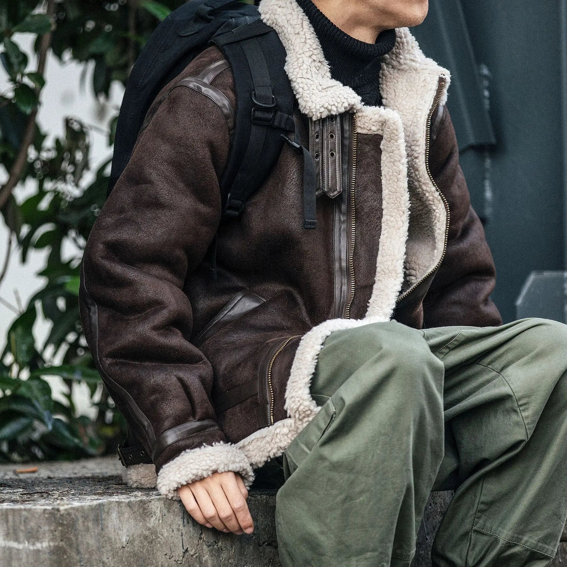 VOIDWEAR SIGNAL_VANISH_09 ☰ jacket worn in Berlin winter street alley, patchwork cotton-padded structure visible under cold light.