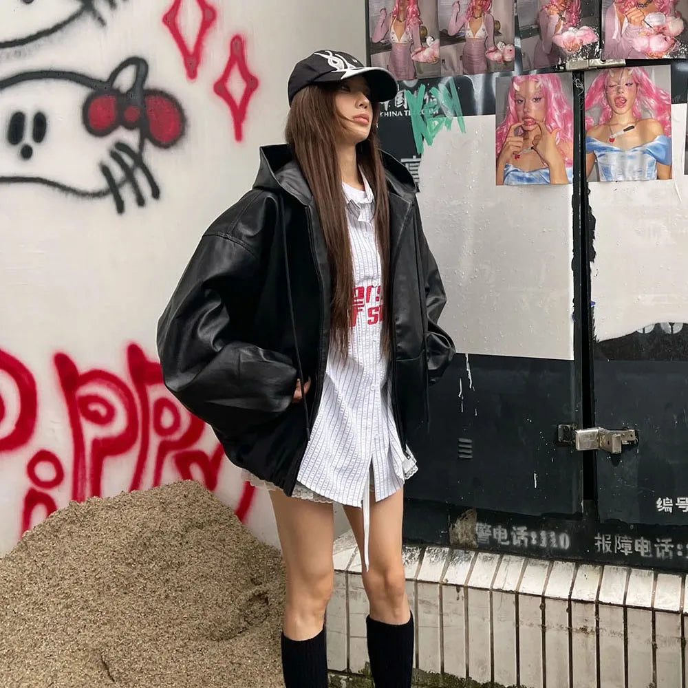 VOIDWEAR SIGNAL_VANISH_06 ☰ windbreaker shown in Tokyo night alley, matte black PU texture visible, signal glyph reflected under neon
