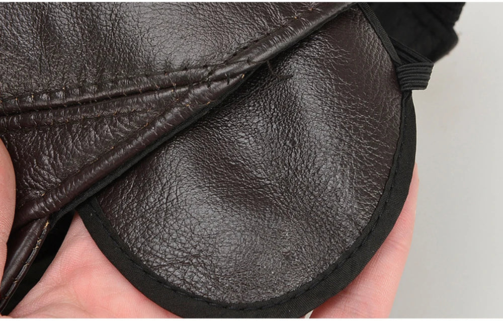 VOIDWEAR SIGNAL_VANISH_07 real cowhide leather earflap cap with adjustable visor, designed as ritual-inspired streetwear for urban shadow gear