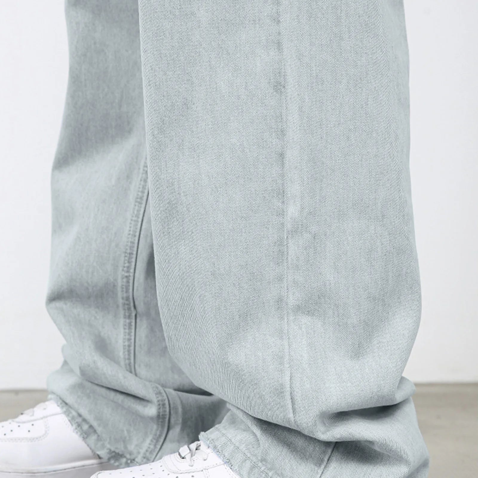 VOIDWEAR VDR_VANISH_01 ☰ hybrid overalls-style baggy jeans, distressed light denim, glyph tab signal detailing, streetwear silhouette