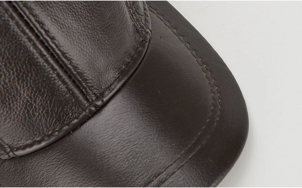 VOIDWEAR SIGNAL_VANISH_07 real cowhide leather earflap cap with adjustable visor, designed as ritual-inspired streetwear for urban shadow gear
