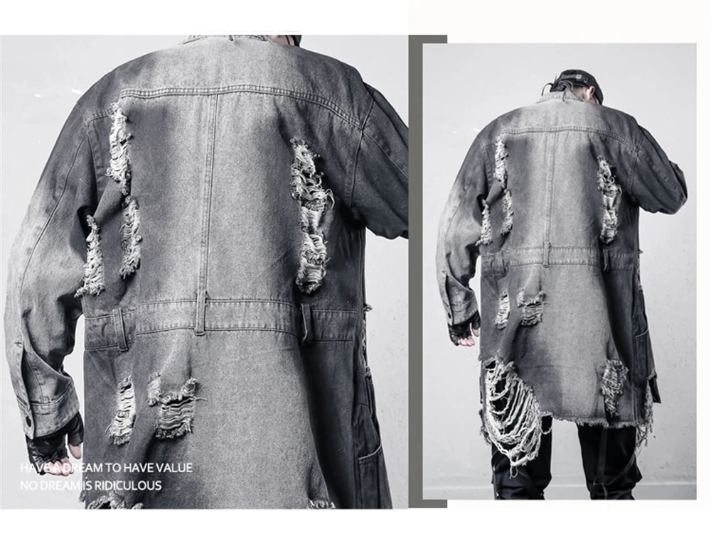 VOIDWEAR VDR_SIGNAL_07 Ritual Jacket — distressed long denim coat with ripped holes, glyph detailing, and loose high-street fit.. Ripped denim jacket shown from the back with a plain background