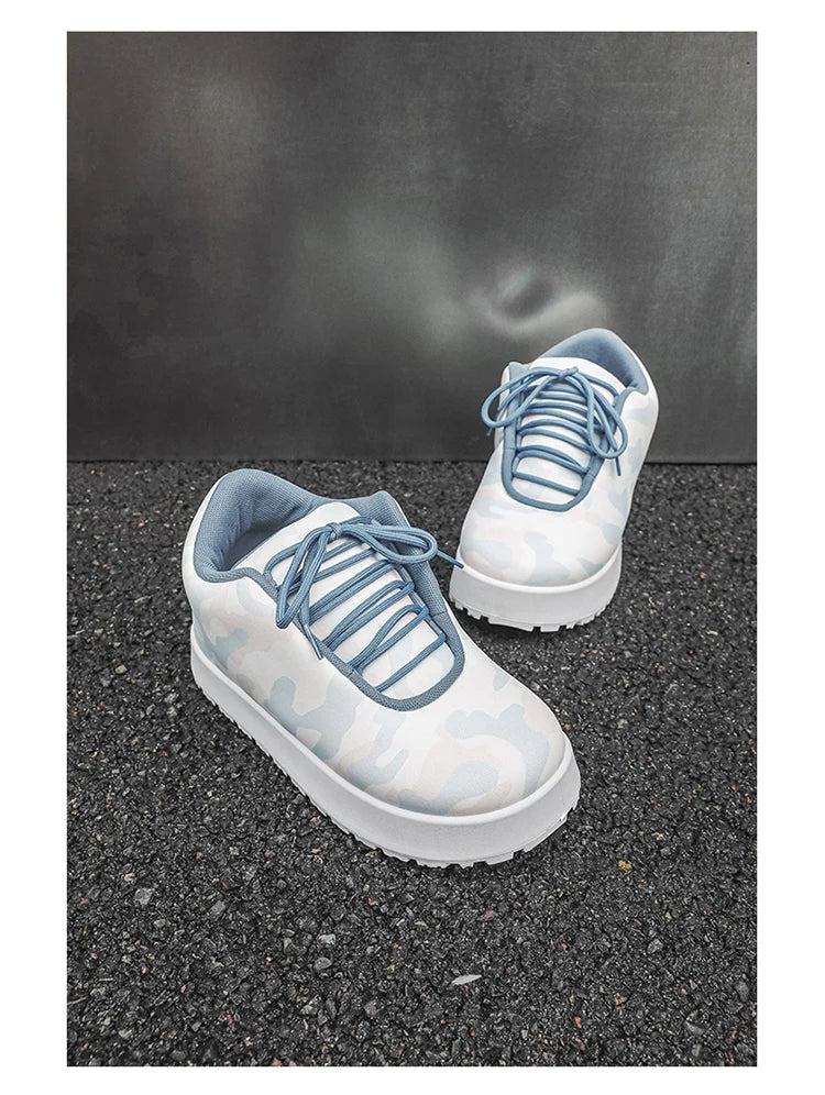 VOIDWEAR CODE_SYSTEM_07 ⚔️ chunky sneaker-style boots shown on a city street in winter, highlighting the microfiber leather upper and thick platform sole.