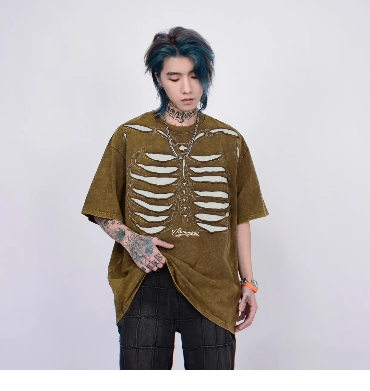 VOIDWEAR VDR_VANISH_05 ripped skeleton tee washed vintage cotton men’s summer streetwear USA. Person wearing a brown skeleton design shirt on a white background