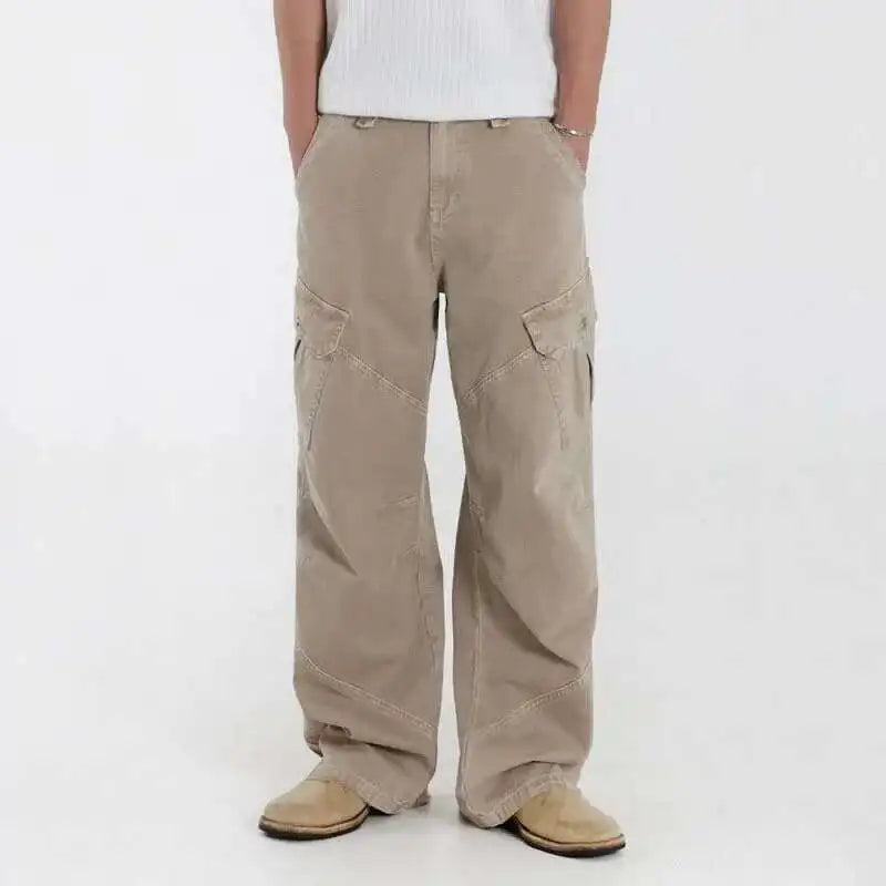 Loose-fit midweight cargo denim jeans with signal glyph embroidery and vanish-mode stitching for men