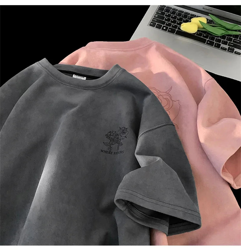 VOIDWEAR VDR_FLO_09 oversized goth floral graphic t-shirt in apricot, styled for streetwear layering. Gray t-shirt with a small logo on a black background