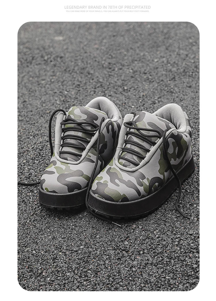 Camouflage-patterned sneakers on a textured surface. VOIDWEAR CODE_SYSTEM_07 ⚔️ chunky sneaker-style boots shown on a city street in winter, highlighting the microfiber leather upper and thick platform sole.