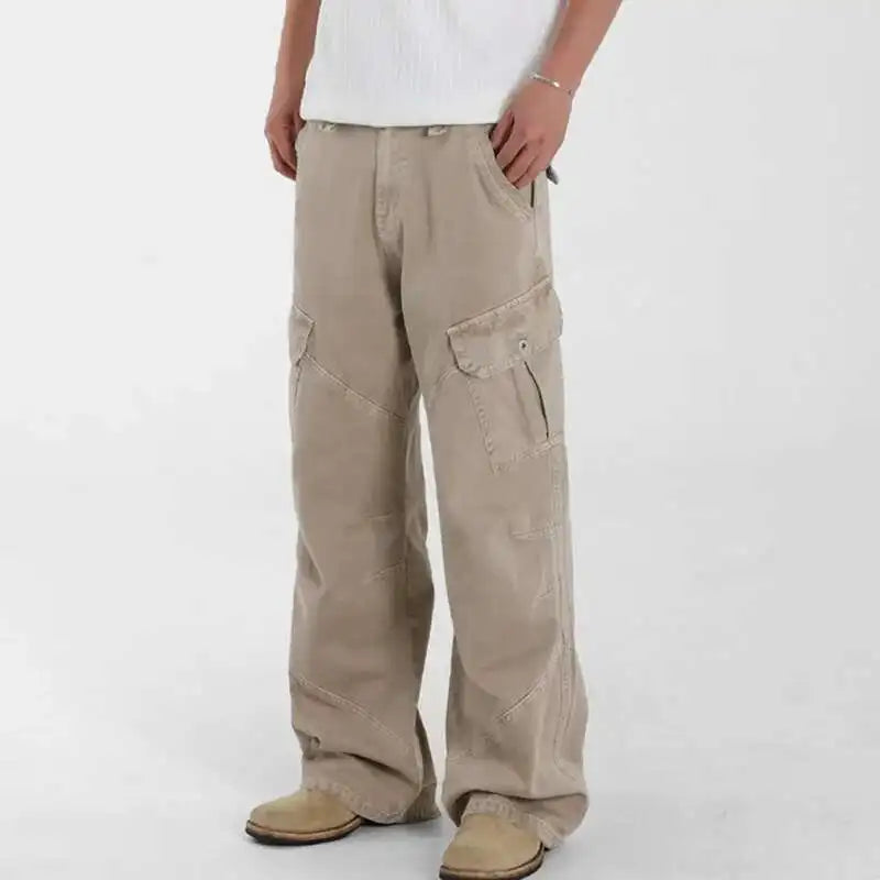 Beige cargo pants worn by a person on a white background