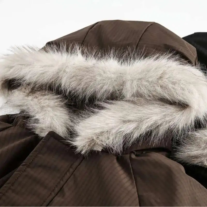VOIDWEAR VDR_VANISH_05 brown padded fur hooded jacket, oversized unisex winter streetwear system, vanish mode ritual coat, U.S. & EU streetwear trend 2025. Brown coat with fur-lined hood on a white background
