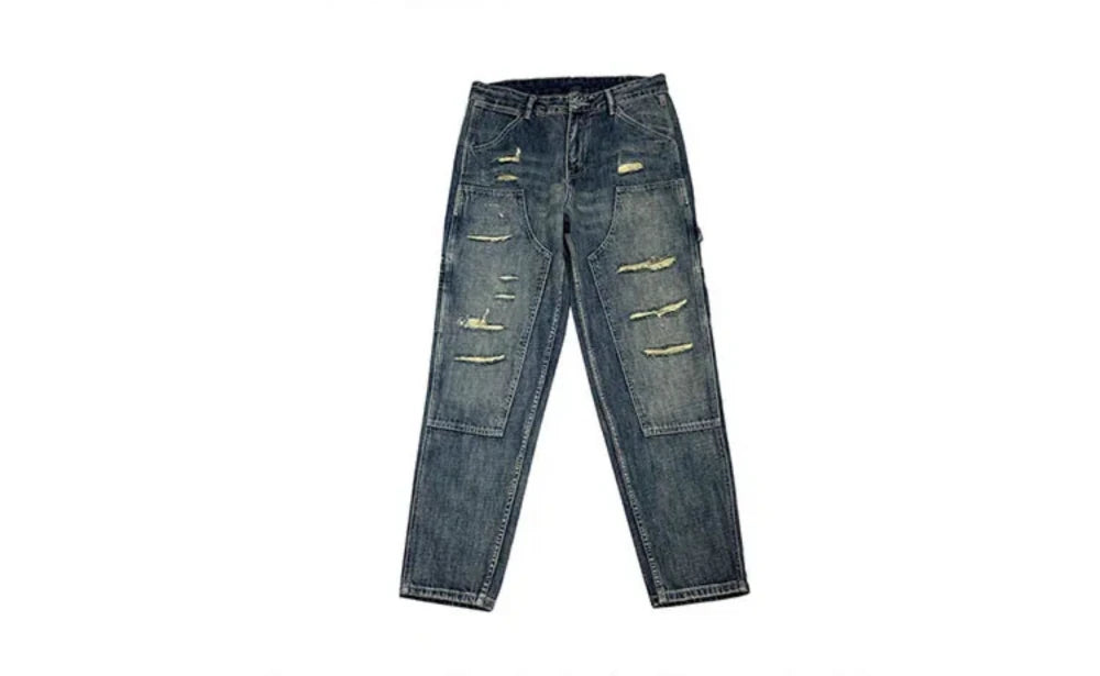VOIDWEAR VDR_VANISH_05 ☰ ripped patch cargo jeans, distressed midweight denim, loose streetwear silhouette, glyph embroidery. Distressed blue jeans on a white background