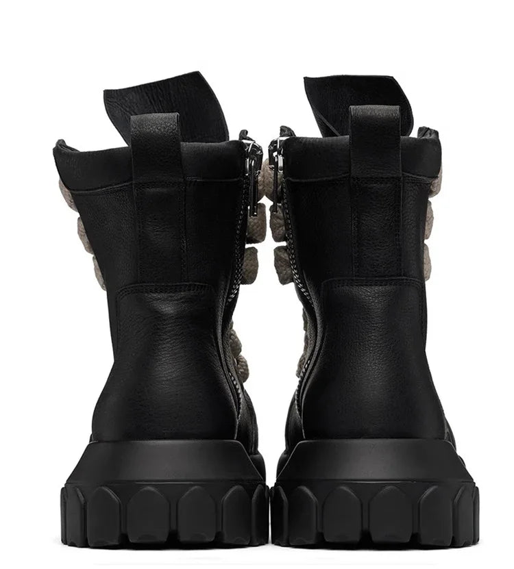 VOIDWEAR VDR_SHADOW_07 ⚑ men’s high-top leather platform boots with chunky sole, handmade in genuine black cow leather for streetwear and techwear style. Pair of black combat boots with unique design elements on a white background