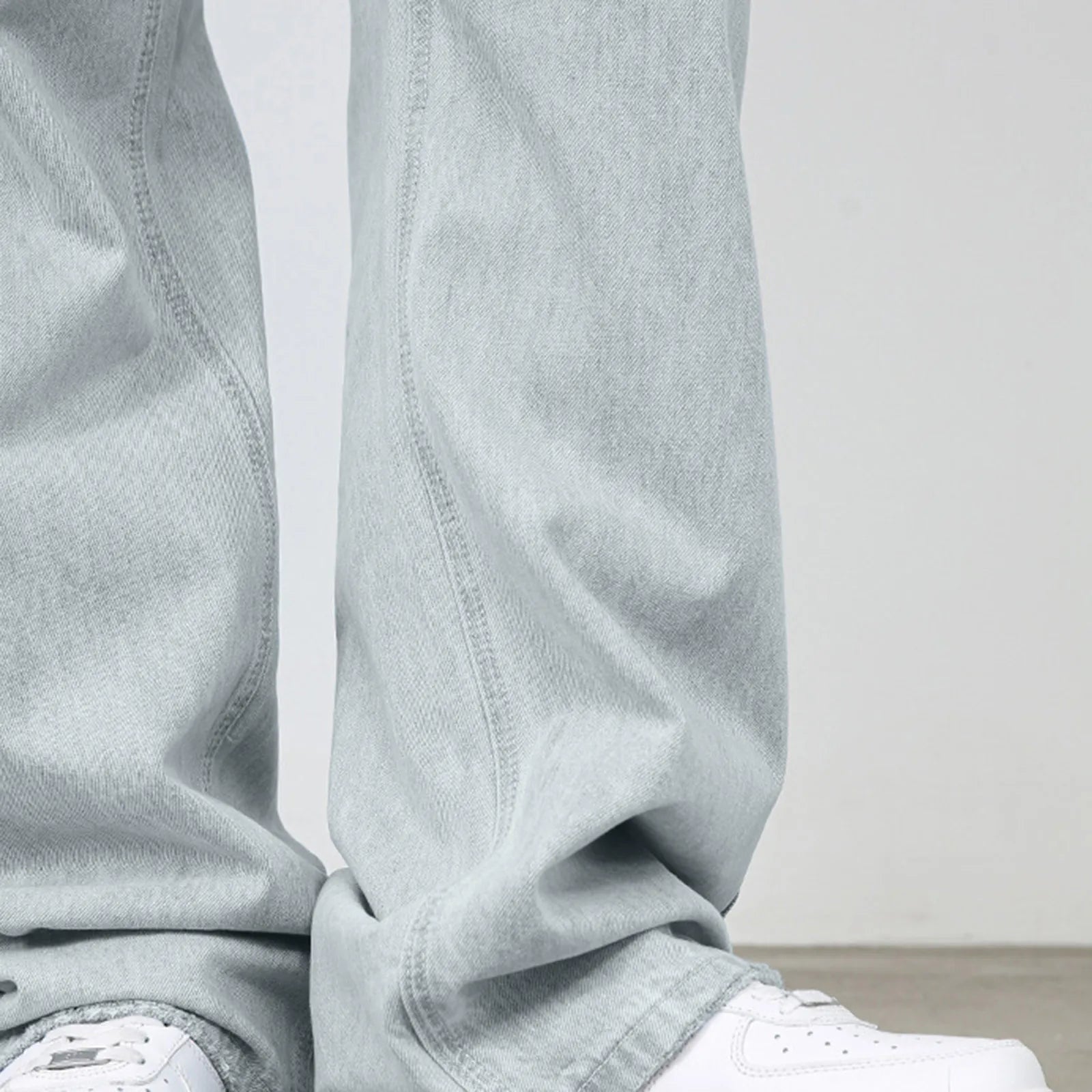 VOIDWEAR VDR_VANISH_01 ☰ hybrid overalls-style baggy jeans, distressed light denim, glyph tab signal detailing, streetwear silhouette