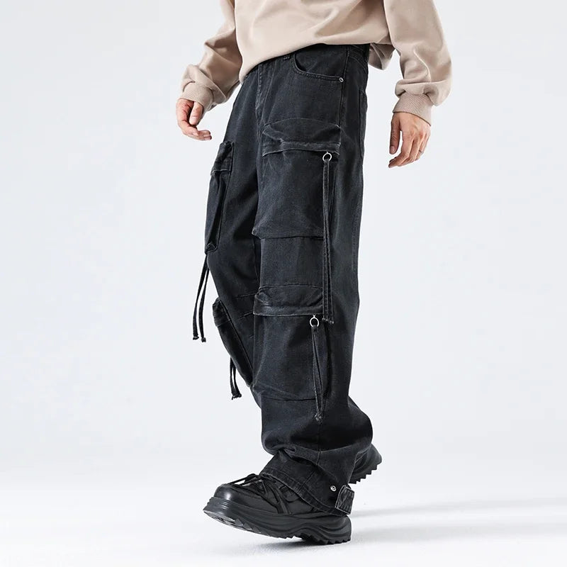 VOIDWEAR SIGNAL_CITY_09 ☰ cargo denim worn in Tokyo side street, multi-pocket structure visible under urban light.