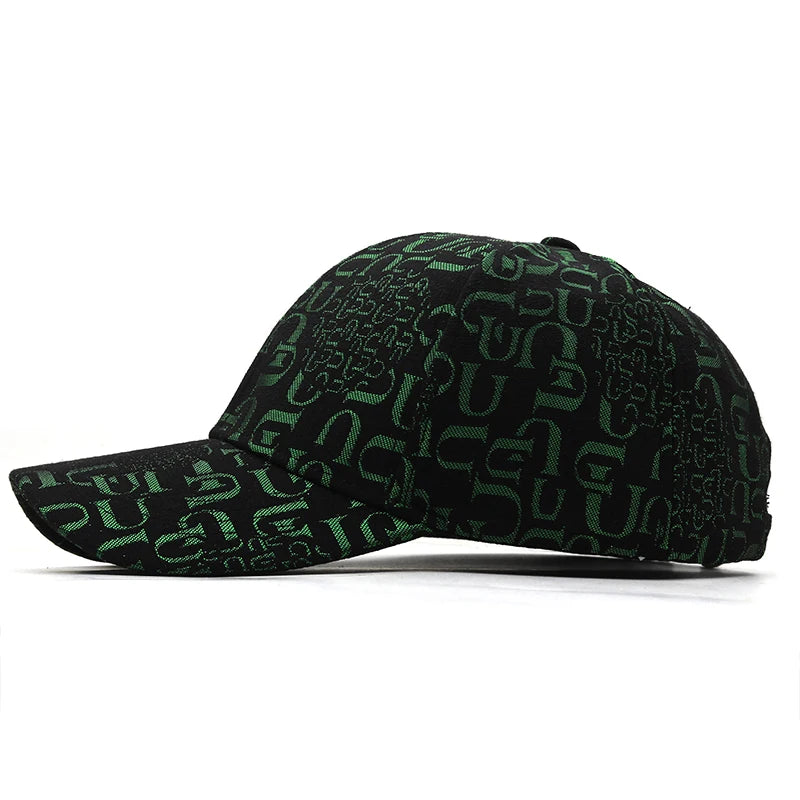VOIDWEAR SIGNAL_VANISH_05 graffiti washed cotton snapback cap with embroidered insignia, photographed in U.S. urban summer streetwear setting. Black cap with green pattern on a white background