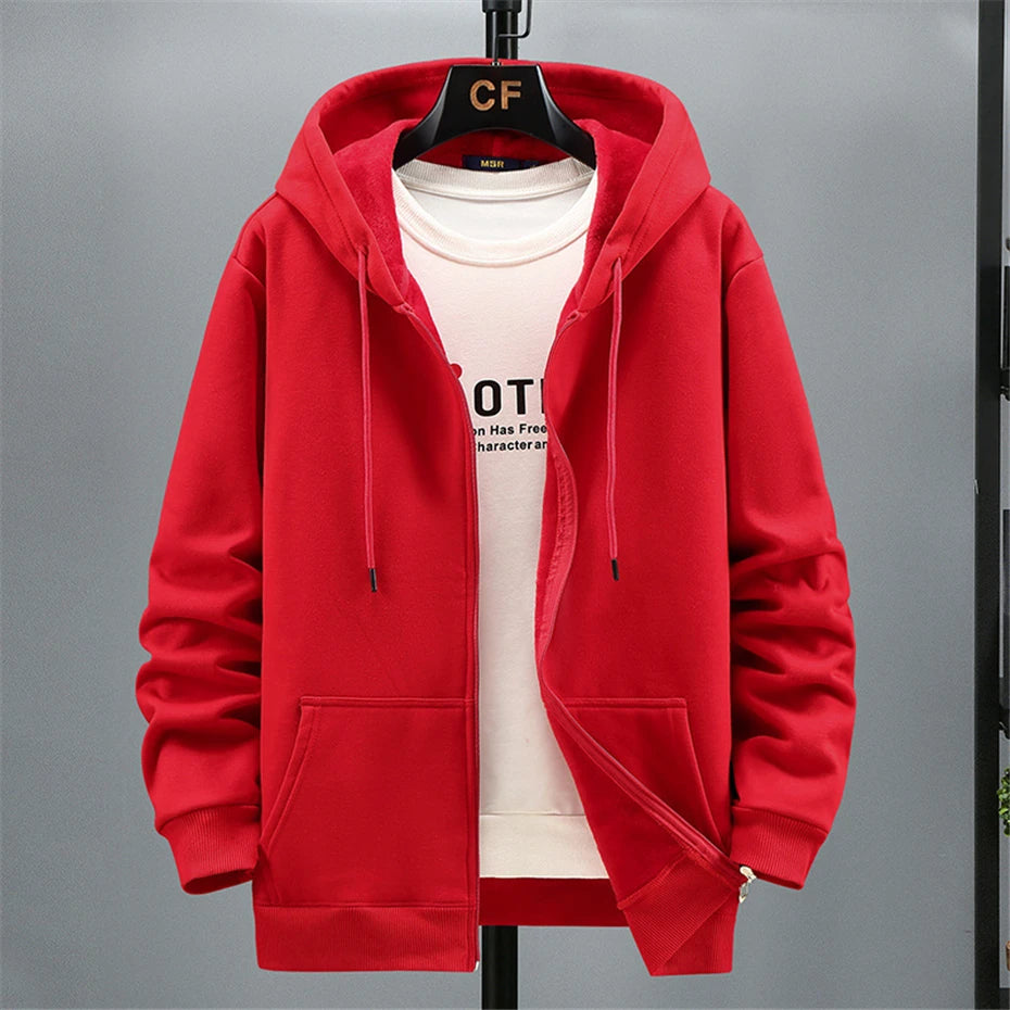 Red hoodie on a hanger against a gray background. OIDWEAR SHADOW_SYSTEM_07 ☰ full-zip hoodie shown worn in a concrete alleyway in winter, highlighting the oversized fit and fleece material.