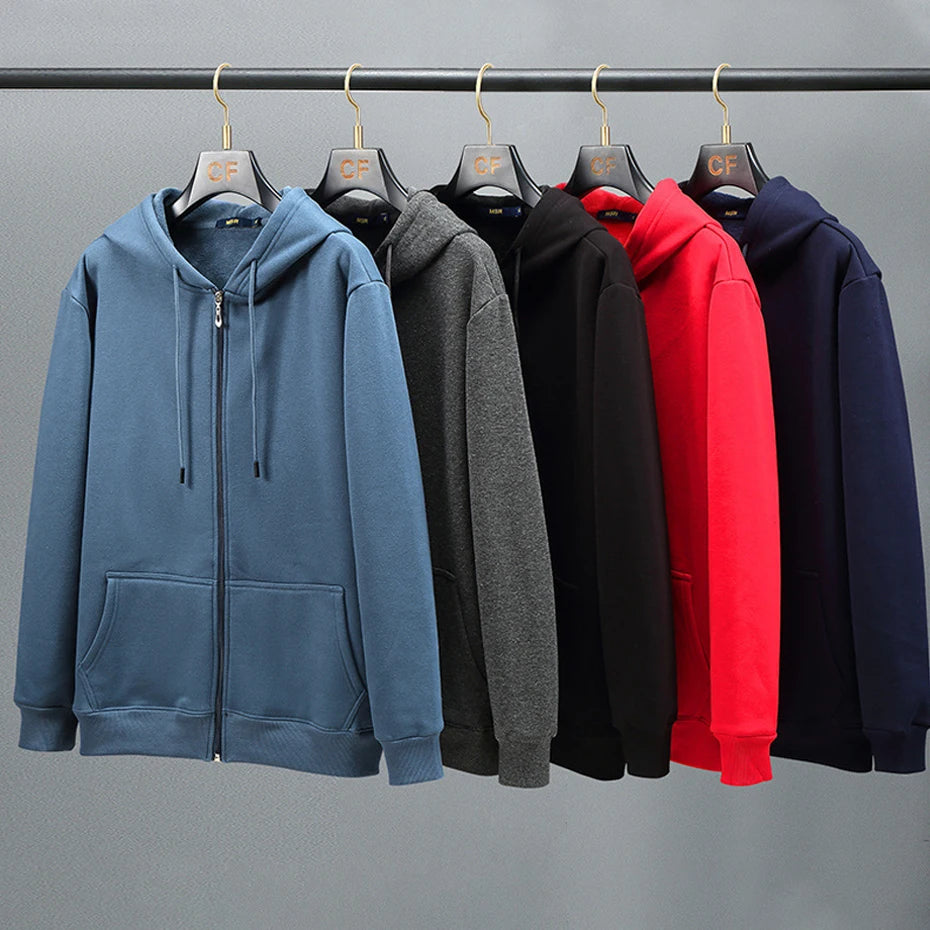 Five hoodies in blue, gray, black, red, and navy hanging on a rack against a gray background.