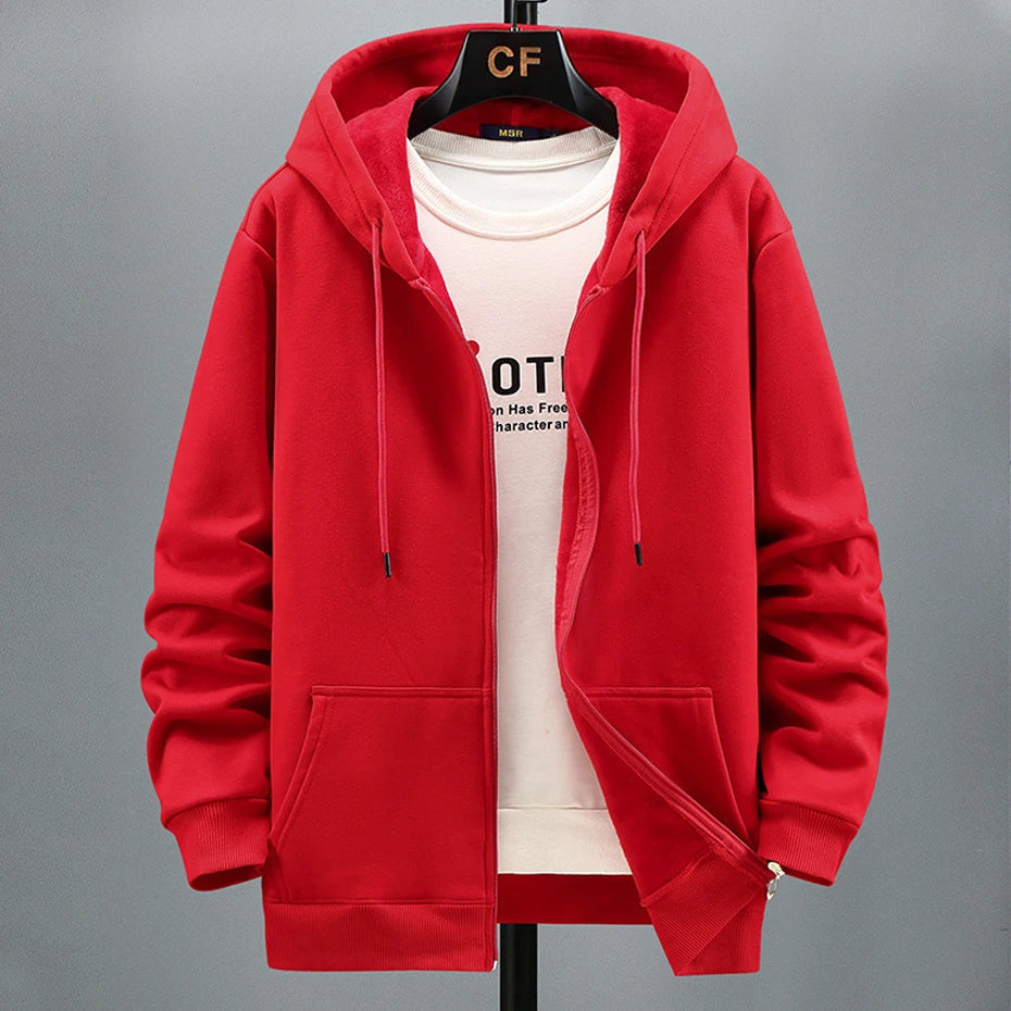 Red hoodie on a hanger against a gray background. OIDWEAR SHADOW_SYSTEM_07 ☰ full-zip hoodie shown worn in a concrete alleyway in winter, highlighting the oversized fit and fleece material.
