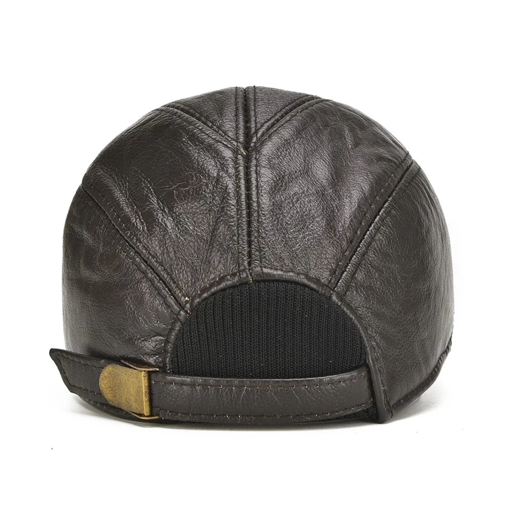 Black leather cap with a gold buckle on a white background