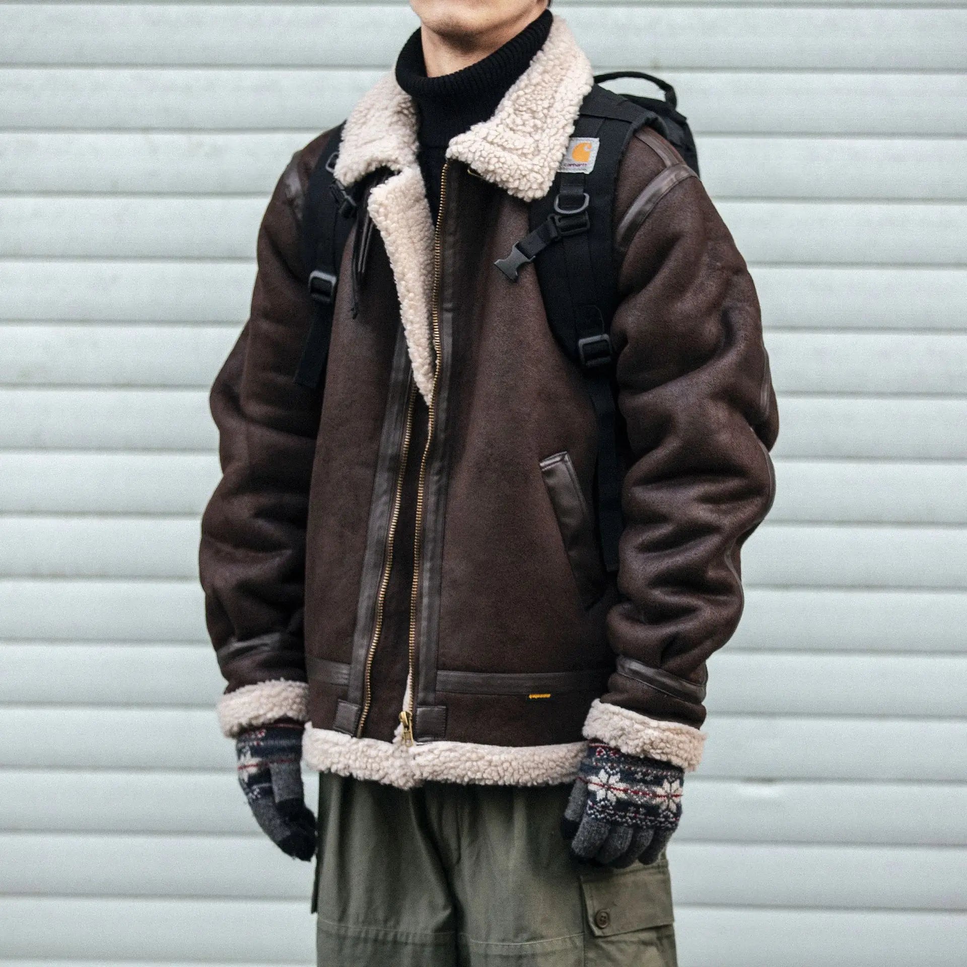 VOIDWEAR SIGNAL_VANISH_09 ☰ jacket worn in Berlin winter street alley, patchwork cotton-padded structure visible under cold light.