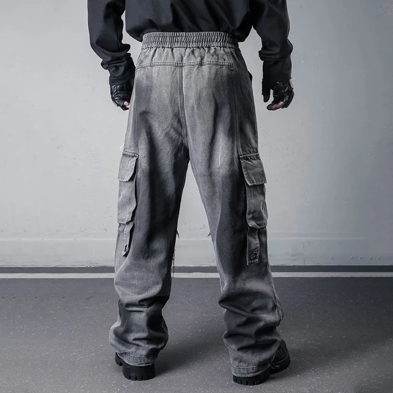 VOIDWEAR SIGNAL_THREAD_07 ☰ wide-leg denim jeans styled in Los Angeles street set, tie-dye pattern visible along heavy seam stitching