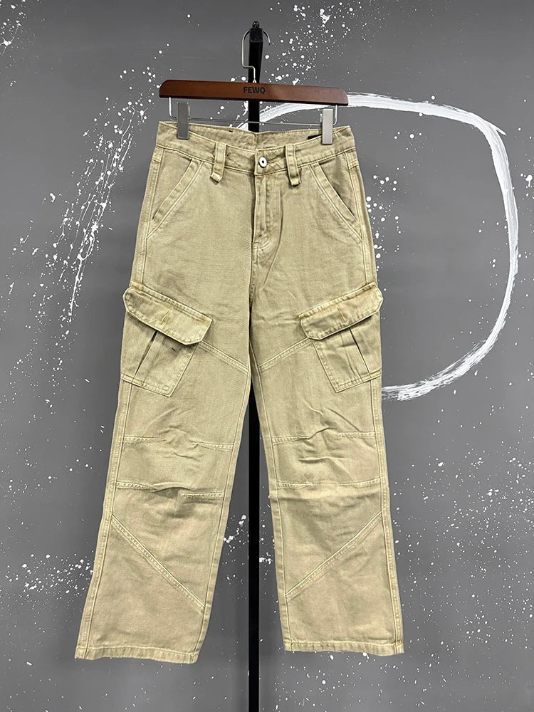VDR_ Khaki cargo pants on a hanger against a gray background
