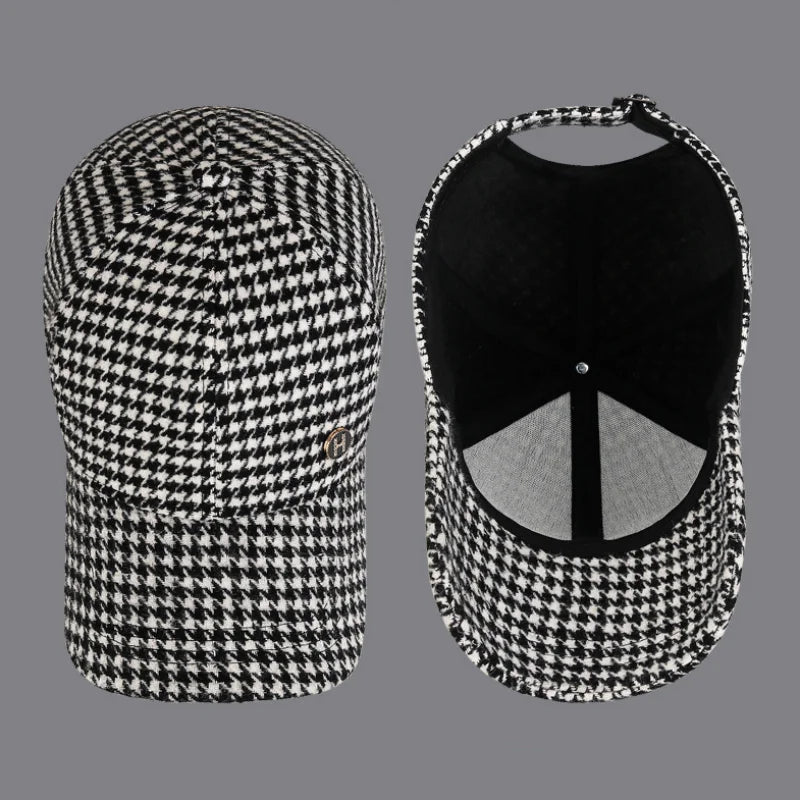 VOIDWEAR SIGNAL_SHADOW_07//◐ houndstooth plaid baseball cap with diamond label insignia and adjustable strap, styled in urban U.S. winter setting.