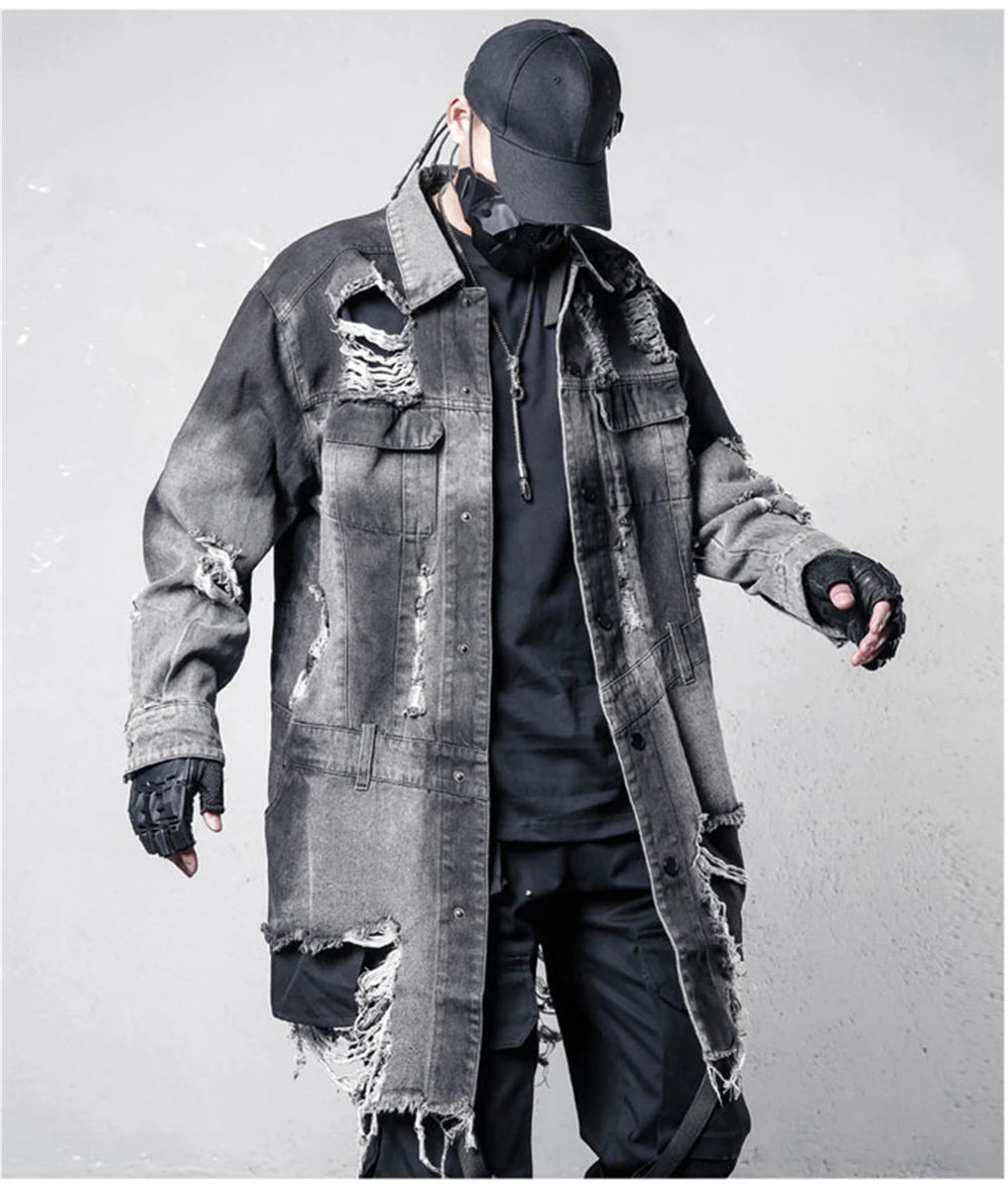 VOIDWEAR VDR_SIGNAL_07 Ritual Jacket — distressed long denim coat with ripped holes, glyph detailing, and loose high-street fit.