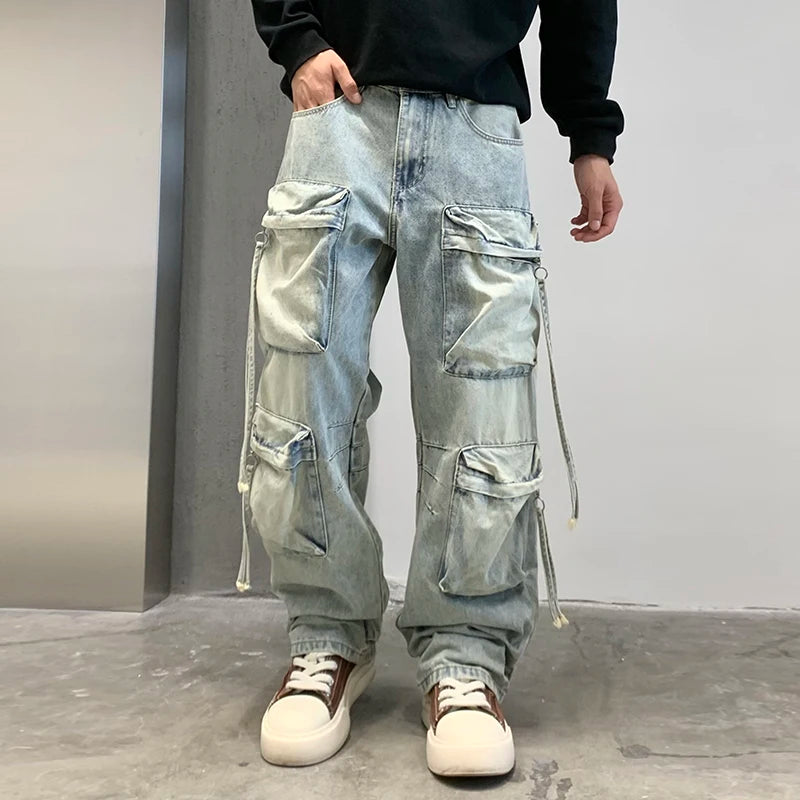 VOIDWEAR SIGNAL_CITY_09 ☰ cargo denim worn in Tokyo side street, multi-pocket structure visible under urban light.