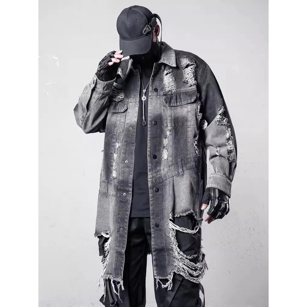 VOIDWEAR VDR_SIGNAL_07 Ritual Jacket — distressed long denim coat with ripped holes, glyph detailing, and loose high-street fit.