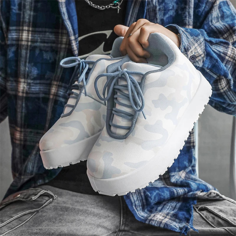 VOIDWEAR CODE_SYSTEM_07 ⚔️ chunky sneaker-style boots shown on a city street in winter, highlighting the microfiber leather upper and thick platform sole.