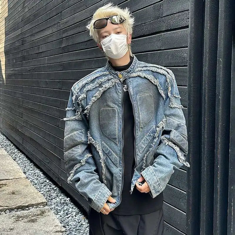VOIDWEAR VDR//VANISH_05 denim motorcycle jacket with tassel shoulders and ritual glyph embroidery, styled for U.S. and EU streetwear culture.