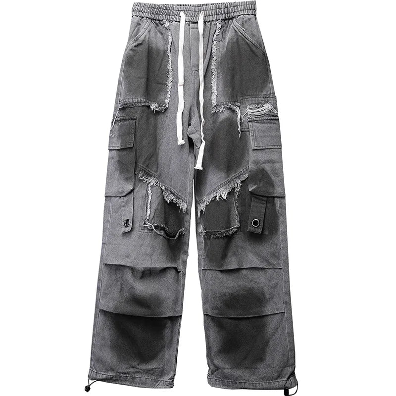 VOIDWEAR SIGNAL_THREAD_07 ☰ wide-leg denim jeans styled in Los Angeles street set, tie-dye pattern visible along heavy seam stitching